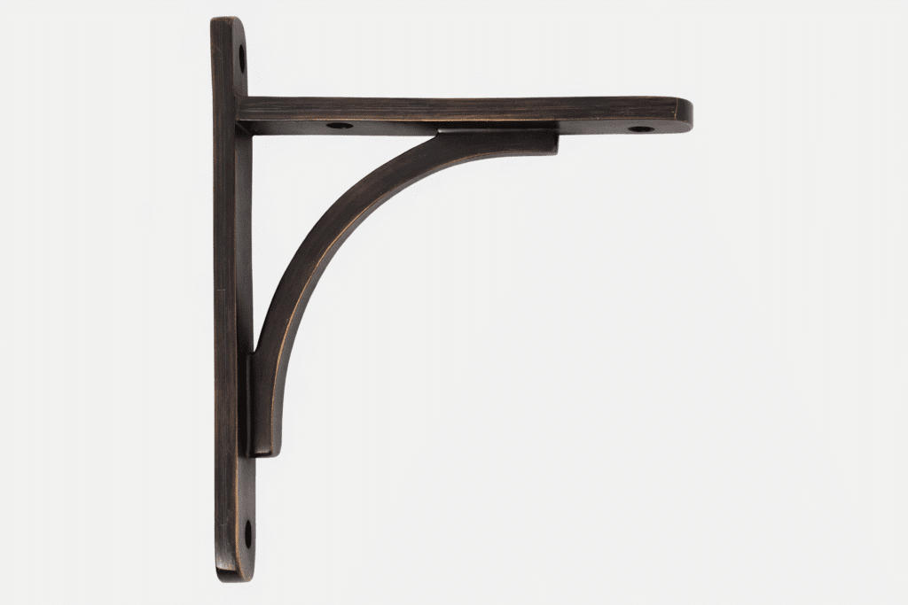 Soporte Decorativo Curvo para Repisa – Acabado Bronce Envejecido